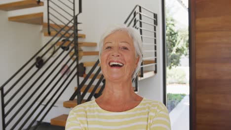Portrait-of-happy-senior-biracial-woman-at-retirement-home