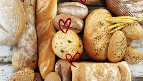 Animation-of-falling-read-hearts-over-bread