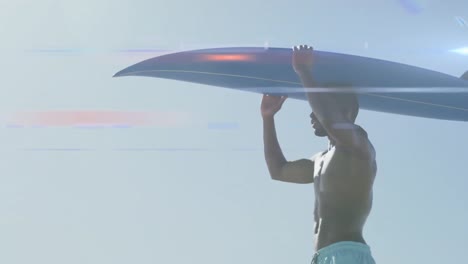 Lichtanimation-über-Einem-Glücklichen-Afroamerikanischen-Mann,-Der-Ein-Surfbrett-Am-Strand-Trägt