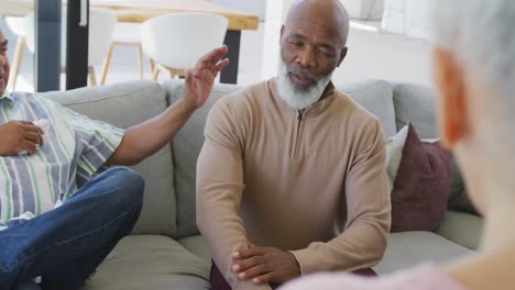 Senior-diverse-people-at-meeting-talking-at-retirement-home