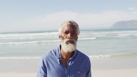 Portrait-of-senior-african-american-man-on-sunny-beach