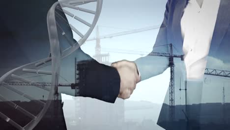 Animation-of-caucasian-business-people-shaking-hands-and-dna-strand-over-building-site