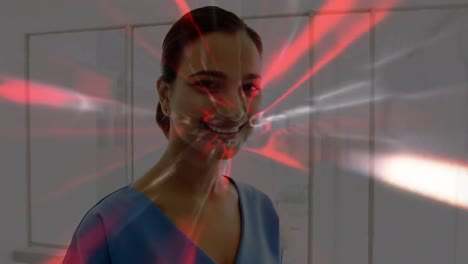Animation-of-light-trails-over-biracial-female-doctor