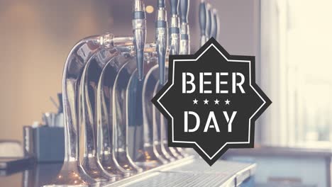 Animation-of-beer-day-text-over-moving-picture-of-beer-taps-on-the-bar