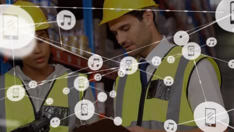Animation-of-network-of-connections-with-icons-over-diverse-warehouse-workers