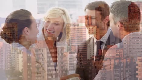 Animation-of-happy-caucasian-businesspeople-shaking-hands-and-talking-over-cityscape