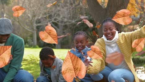 Animation-of-fall-leaves-over-happy-african-american-family-in-autumn-park
