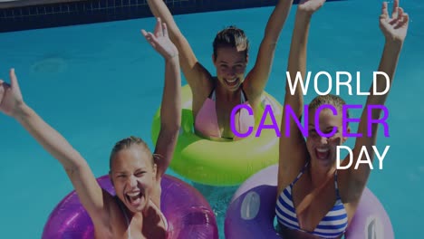 Animation-of-world-cancer-day-over-happy-diverse-women-in-swimming-pool