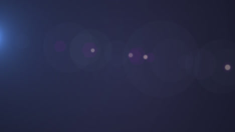 Digitale-Animation-Von-Lichtflecken-Vor-Kopierraum-Auf-Blauem-Hintergrund