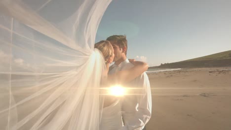 Animation-of-light-over-happy-caucasian-newly-married-couple-kissing