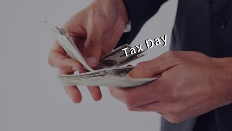 Animation-of-tax-day-text-over-caucasian-man-holding-banknotes