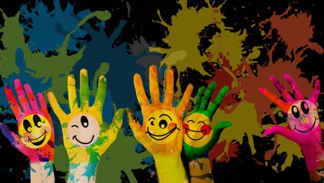 Animation-of-hands-painted-in-diverse-colours-with-emoticons-over-black-background-with-stains