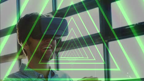 Animation-of-tunnel-with-neon-shapes-over-biracial-man-using-vr-headset
