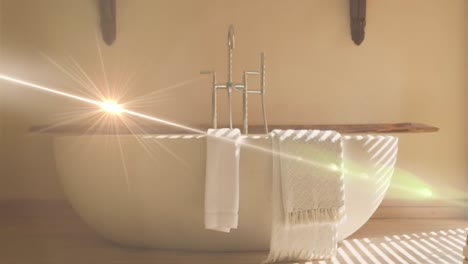 Animation-of-light-spots-over-bath-and-towels