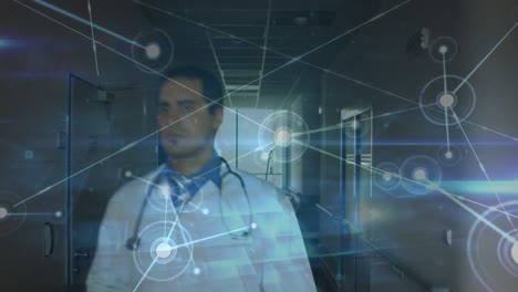 Animation-of-connections-over-caucasian-male-doctor-walking-through-corridor