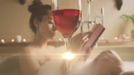 Animation-of-light-spots-over-caucasian-woman-taking-bath-with-wine