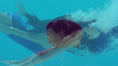 Animation-of-caucasian-female-swimmer-diving-over-caucasian-female-swimmer-swimming