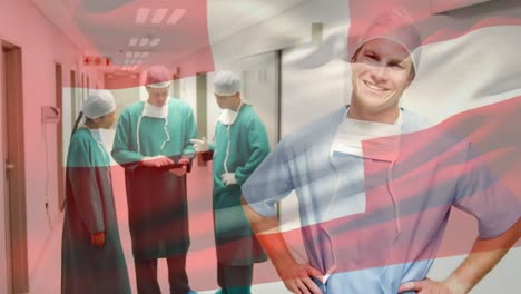Animation-of-flag-of-switzerland-over-diverse-doctors-smiling-and-talking