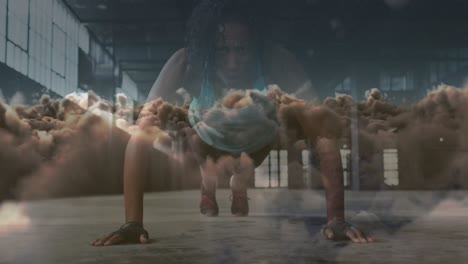 Animation-of-clouds-over-african-american-sportswoman-doing-push-ups