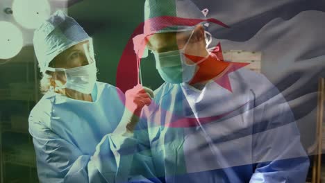 Animation-of-flag-of-algeria-over-caucasian-doctors-during-surgery