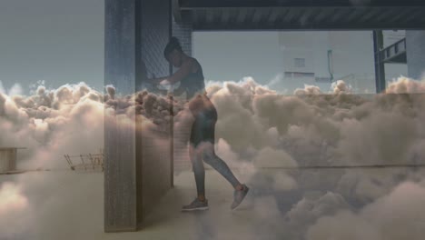 Animación-De-Nubes-Sobre-Mujer-Afroamericana-Estirándose