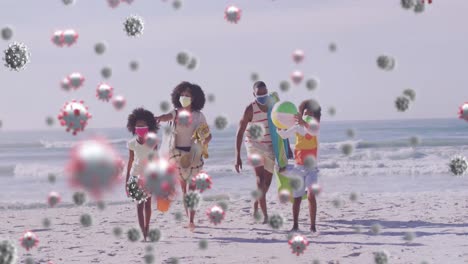 Animation-of-virus-cells-over-african-american-family-walking-at-beach