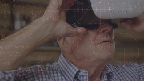 Animation-of-mathematical-equations-over-senior-caucasian-man-using-vr-headset