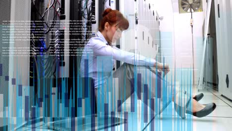 Animation-of-data-processing-over-caucasian-businesswoman-in-server-room