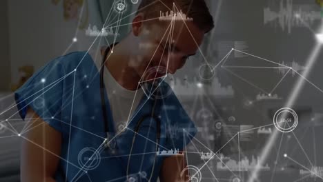 Animation-of-network-of-connections-over-caucasian-male-surgeon-using-tablet