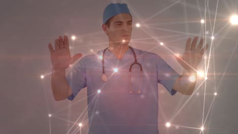 Animation-of-network-of-connections-over-caucasian-male-surgeon
