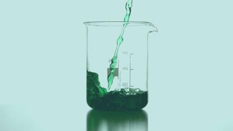 Animation-of-green-shapes-over-beaker-with-liquid