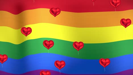 Animation-of-hearts-floating-over-rainbow-flag