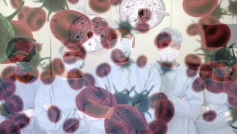 Animation-of-covid-19-cells-over-diverse-surgeons-wearing-face-masks-in-operating-theatre