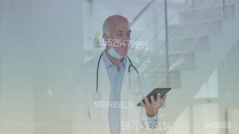 Animation-of-data-processing-over-caucasian-male-doctor-with-tablet
