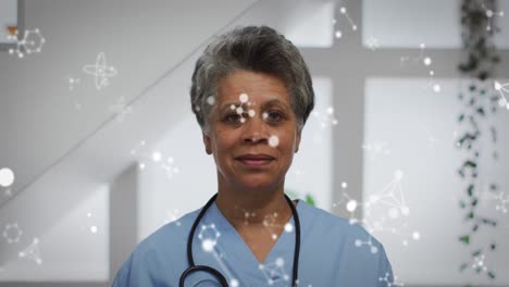 Animation-of-shapes-over-african-american-female-doctor