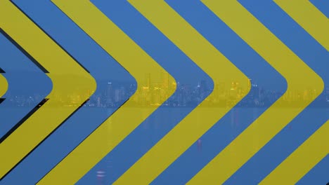Animation-of-yellow-and-blue-arrows-covering-cityscape