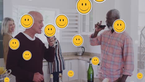 Animation-Von-Emoji-Symbolen-über-Einer-Gruppe-Von-Senioren,-Die-Wein-Trinken