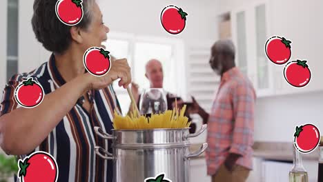 Animation-of-tomato-icons-over-diverse-group-of-seniors-cooking