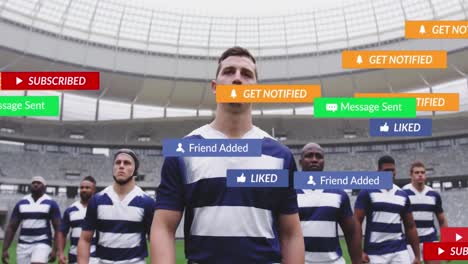 Animation-Von-Mediensymbolen-über-Verschiedenen-Männlichen-Rugbyspielern-Im-Stadion
