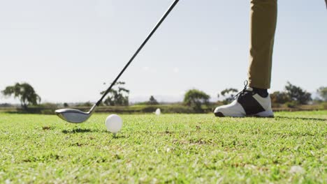 Video-of-legs-of-caucasian-man-playing-golf-on-golf-field