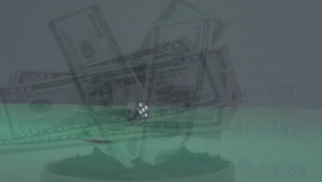 Animations-of-cube-over-dollars-banknotes