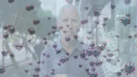 Animation-of-virus-cells-floating-over-caucasian-senior-man