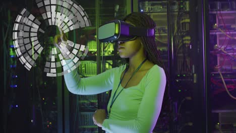 Animation-of-globe-over-african-american-woman-wearing-vr-headset-over-servers