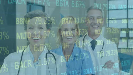 Animation-of-financial-data-over-happy-caucasian-female-and-male-doctors-looking-at-camera