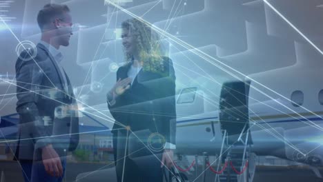 Animation-of-network-of-connections-over-caucasian-businessman-and-businesswoman-on-airport