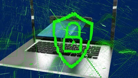 Animation-of-digital-shield-with-padlock-over-laptop-on-navy-background
