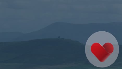 Animation-of-heart-icon-over-landscape