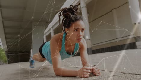 Animation-of-network-of-connections-over-fit-biracial-woman-doing-plank