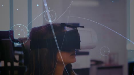 Animation-of-network-of-connections-over-asian-woman-wearing-vr-headset