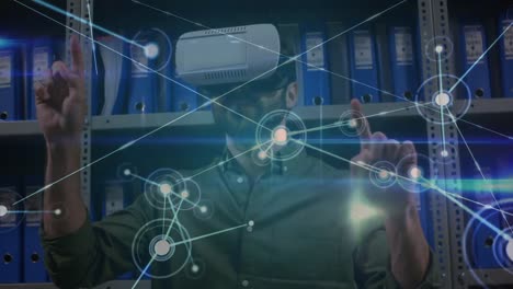 Animation-of-network-of-connections-over-caucasian-man-wearing-vr-headset